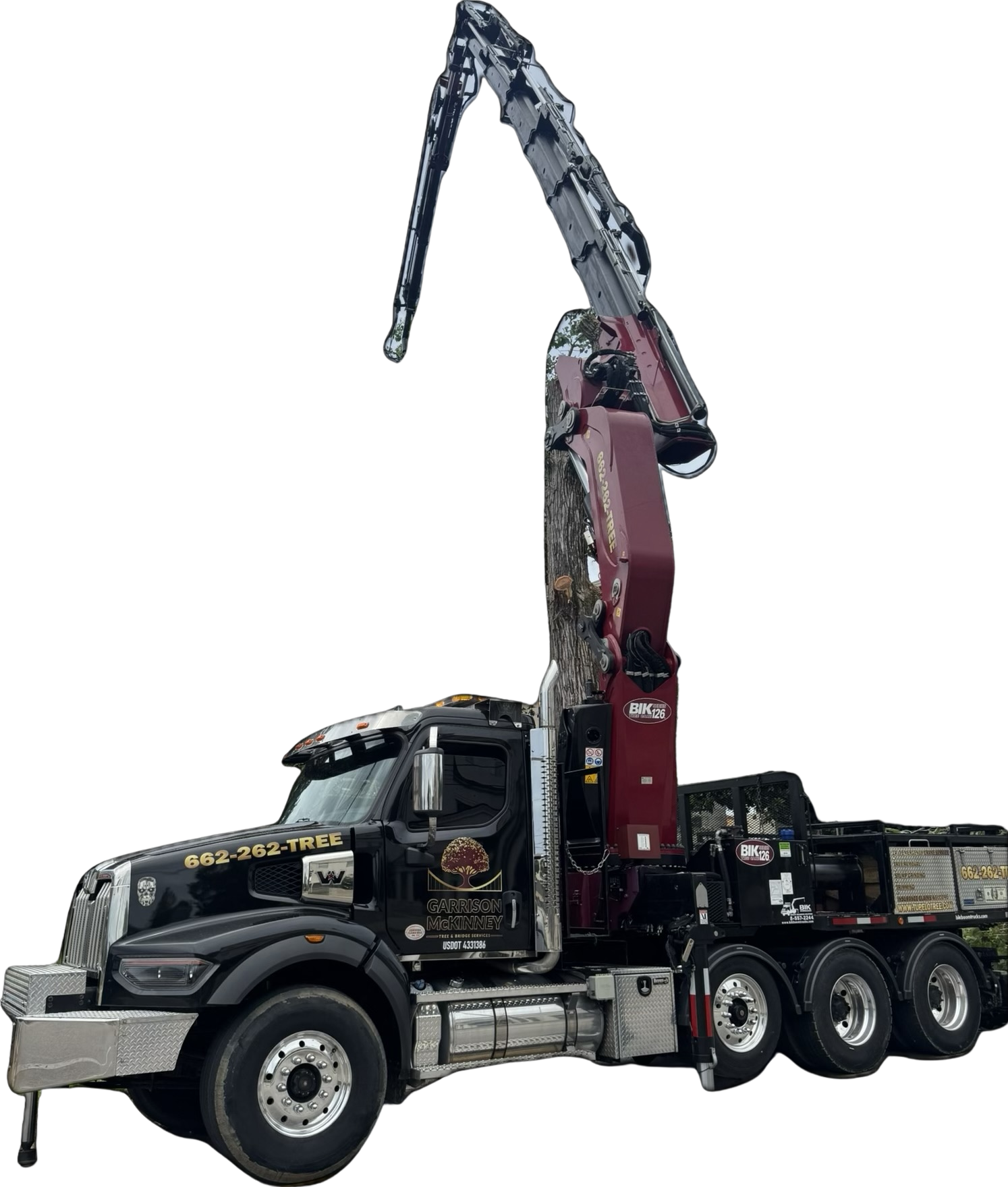 Garrison McKinney black Western Star crane truck with BIK 126 grapple saw
